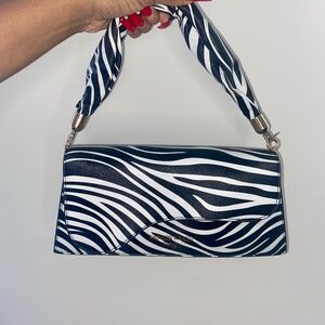 Metropolitan Candy Zebra Print Baguette Purse Statement